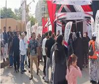 حماس وطني يملأ لجان الجيزة.. الطوابير تمتد والأعلام ترفرف والشرطة توفر غطاء الأمن والأمان 