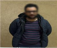 ضبط شخص يحث الناخبين على التصويت لصالح أحد المرشحين بمحيط لجنة بالأهرام