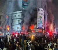 ارتفاع حصيلة ضحايا حريق بمركز تسوق في باكستان إلى 14 قتيلا و74 مفقودا 