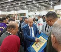 قيادات أكاديمية بجامعة القاهرة يزورون جناح دار الكتب بمعرض الكتاب
