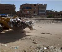 رفع 57 طن مخلفات وتحرير 15 محضر إشغال في قنا