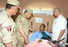 «حجازي» يطمئن على مصابي العمليات الإرهابية بمستشفيات القوات المسلحة‎