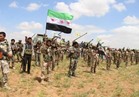 سوريا الديمقراطية ترفع العلم السوري على مبنى عسكري في عفرين بحلب