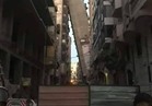 فيديو| إخلاء جميع العقارات المجاورة للعقار المائل بمنطقة الأزاريطة في الإسكندرية