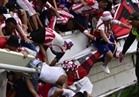 إصابة 13 مشجعا إثر انهيار حاجز مدرج في ملعب بكولومبيا
