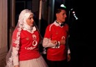 فيديو| عريس وعروسة يرتديان قميص "الأهلي" في حفل زواجهم بشبين الكوم 